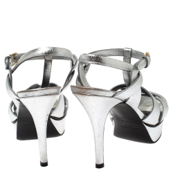 Pre Owned صندل سان لوران تريبوت جلد فضي ميتاليك نعل سميك مقاس 37