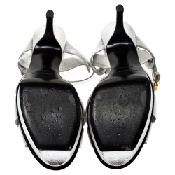 Pre Owned صندل سان لوران تريبوت جلد فضي ميتاليك نعل سميك مقاس 37