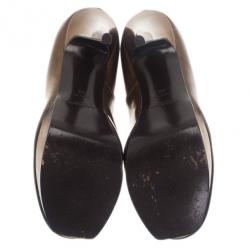 مملوكة مسبقًا حذاء سان لوران باريس مقدمة مرتفعة جلد ميتاليك برونزي "تريبيوت 105" مقاس 38