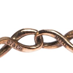 Pre Owned Tiffany & Co. Infinity Rubedo Narrow Band Ring Size 52