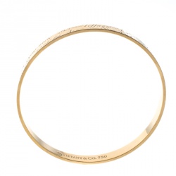 Pre Owned Tiffany & Co. Notes Engraved 18k Yellow Gold Narrow Bangle Bracelet 19cm