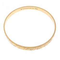 Pre Owned Tiffany & Co. Notes Engraved 18k Yellow Gold Narrow Bangle Bracelet 19cm