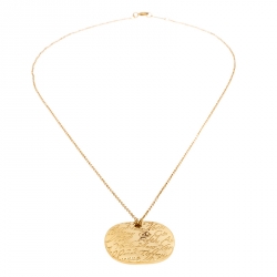 Pre Owned Tiffany & Co. Tiffany Notes Engraved 18k Yellow Gold Round Wave Pendant Necklace