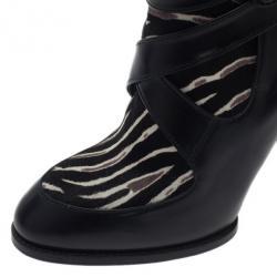 مملوكة مسبقًا بوت كاحل تودز شعر مهر وجلد طبع حمار وحشي مقاس 39.5