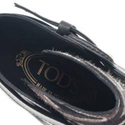 مملوكة مسبقًا بوت كاحل تودز شعر مهر وجلد طبع حمار وحشي مقاس 39.5