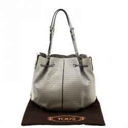 مملوكة مسبقًا حقيبة يد تودز أربطة شهيرة جلد لامعة أرجوانية