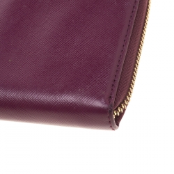 Pre Owned محفظة توري برش سحاب ملتف جلد عنابية