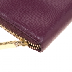 Pre Owned محفظة توري برش سحاب ملتف جلد عنابية