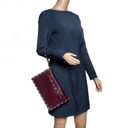 Pre Owned Valentino Burgundy Leather Rockstud Wristlet Clutch