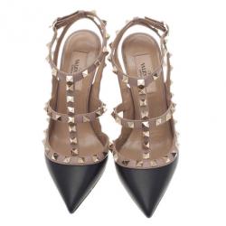 مملوكة مسبقًا صندل فالنتينو ترصيعات روكستاد جلد أسود وبيج مقاس 36