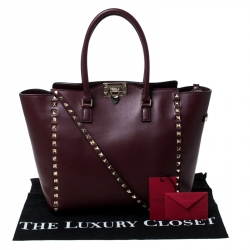 Pre Owned حقيبة شوبر فالنتينو روكستاد جلد عنابية صغيرة 