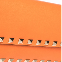 Pre Owned Valentino Neon Orange Leather Rockstud Bracelet Clutch