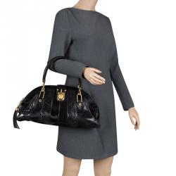 مملوكة مسبقًا حقيبة فيرساتشي جلد تمساح، ثعبان، فرو عجل وسويدي سوداء