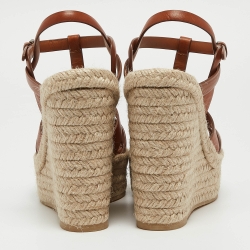 مملوكة مسبقًا صندل إيف سان لوران تربيوت جلد بني كعب روكي مقاس 39.5