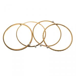 Pre Owned Alexander McQueen Armour Skull Gold Tone Set of 4 Bangles One Size