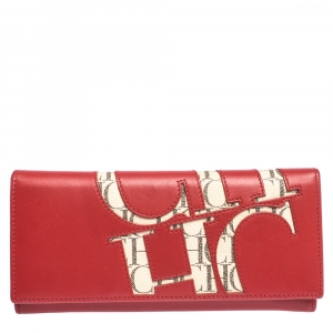 Pre Owned Carolina Herrera Red Leather And Beige Monogram Canvas Continental Wallet