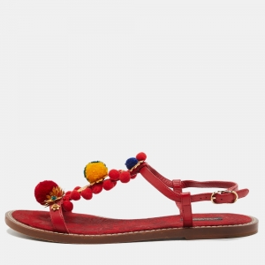 Pre Owned Dolce & Gabbana Red Leather Pom Pom and Crystal Embellished Ankle Strap Flat Sandals Size 40