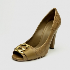 Pre Owned Gucci GG Logo Stamped Guccissima Caramel Leather Open Toe Pumps Size 38.5