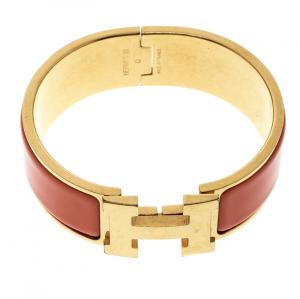 Pre Owned Hermes Clic Clac H Orange Enamel Gold Plated Wide Bracelet PM