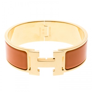 Pre Owned Hermes Clic Clac H Gold Plated Orange Enamel Bracelet