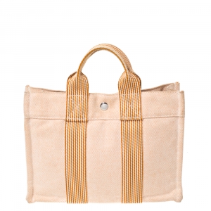 مملوكة مسبقًا Hermes Orange/White Canvas Fourre Tout PM Bag