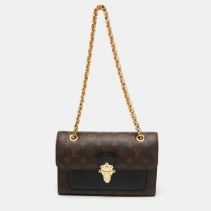 مملوكة مسبقًا Louis Vuitton Black Leather And Monogram Canvas Victoire Bag