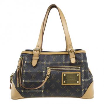 Louis Vuitton Limited Edition Riveting Tote