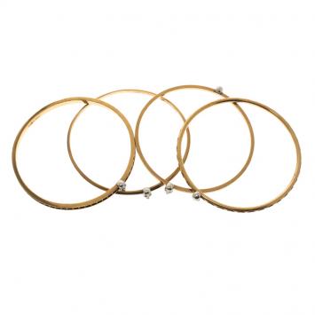 Pre Owned Alexander McQueen Armour Skull Gold Tone Set of 4 Bangles One Size