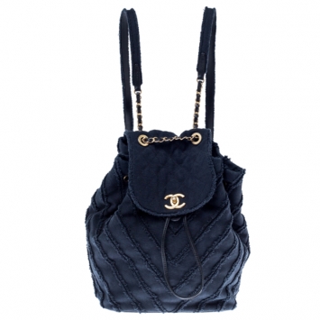 Pre Owned Chanel Navy Blue  Chevron Denim Medium Drawstring Patchwork Backpack                        
