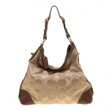 Pre Owned Coach Beige/Brown Signature Canvas and Leather Hobo