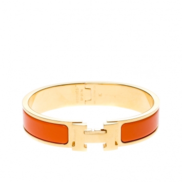 Pre Owned Hermes Clic Clac H Orange Enamel Gold Plated Narrow Bracelet PM