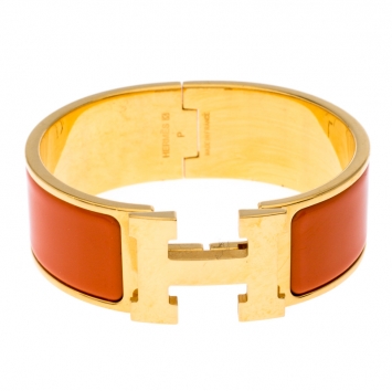 Pre Owned Hermes Clic Clac H Orange Enamel Gold Plated Wide Bracelet PM
