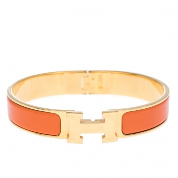 Pre Owned Hermes Clic H Orange Enamel Gold Plated Narrow Bracelet GM