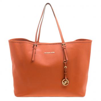 Pre Owned Michael Kors Orange Saffiano Leather Jetset Travel Tote
