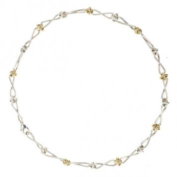 Pre Owned Tiffany & Co. Paloma Picasso Twist Silver and 18 K Yellow Gold Necklace