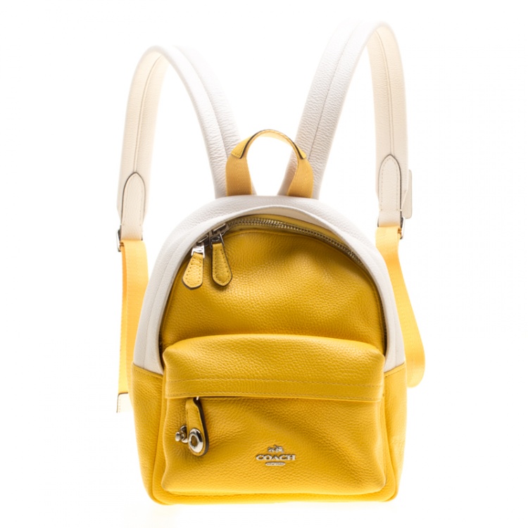 yellow coach backpack