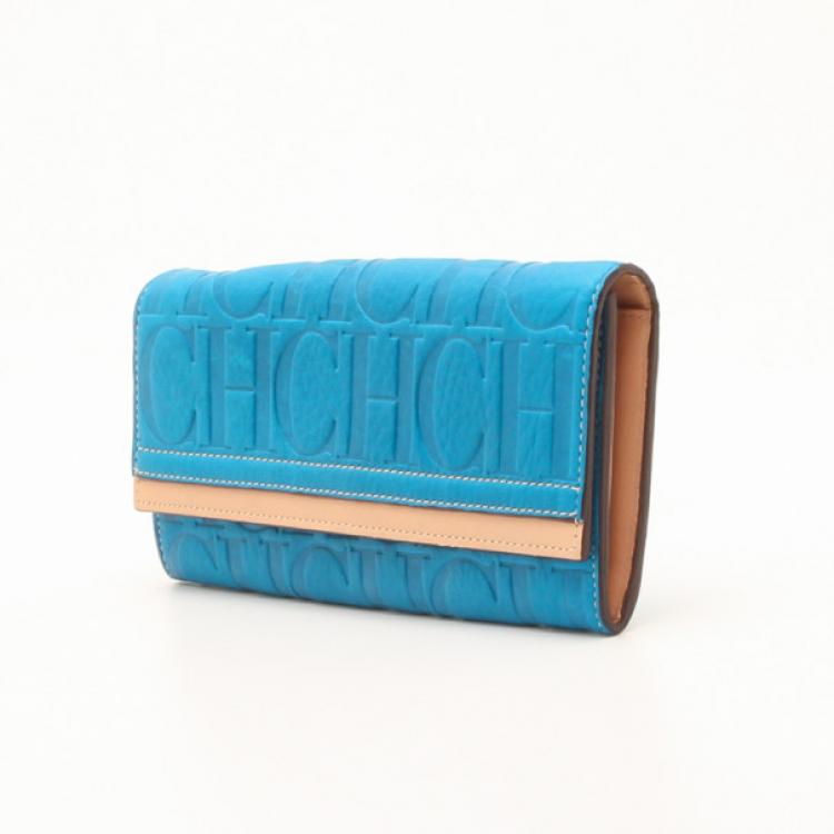 CAROLINA HERRERA BLUE MONOGRAM EMBOSSED CONTINENTAL WALLET