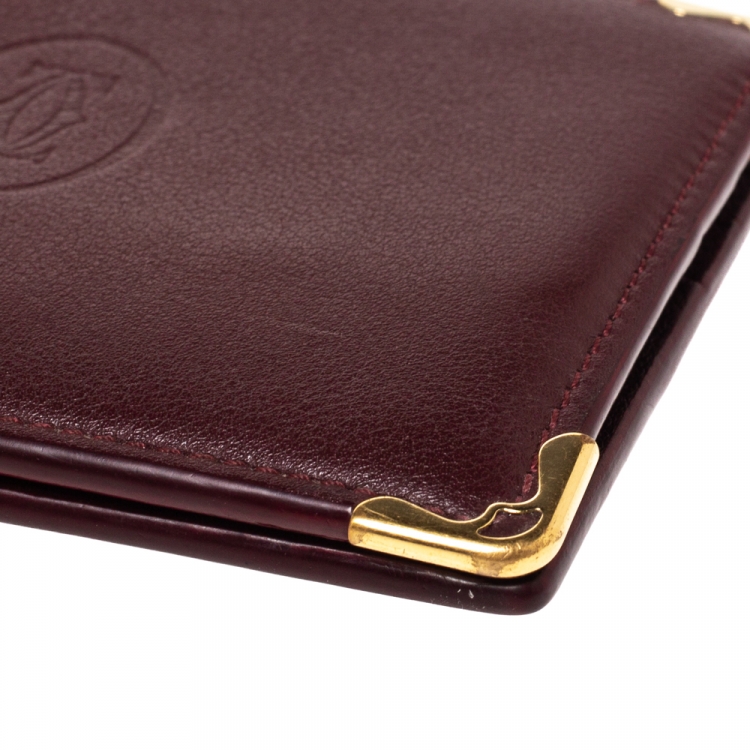 مملوكة مسبقًا Cartier Burgundy Leather Must De Cartier 6CC Bifold Wallet