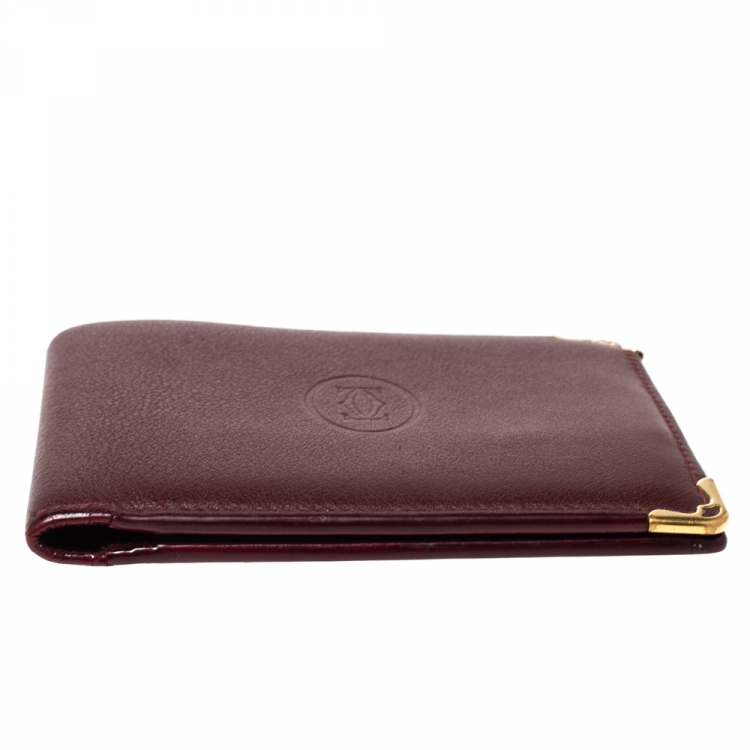 مملوكة مسبقًا Cartier Burgundy Leather Must De Cartier 6CC Bifold Wallet