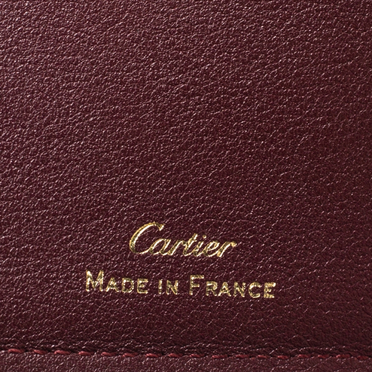 مملوكة مسبقًا Cartier Burgundy Leather Must De Cartier 6CC Bifold Wallet