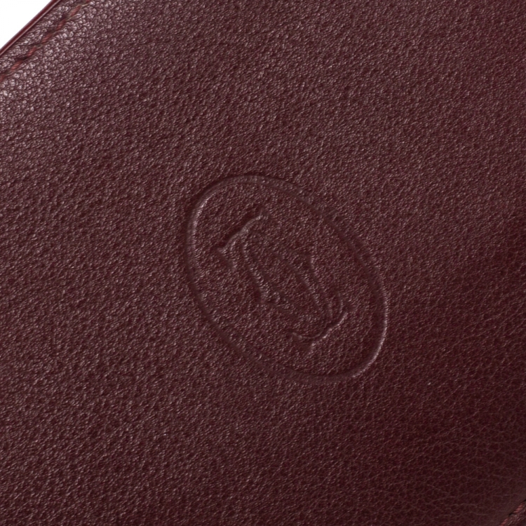 مملوكة مسبقًا Cartier Burgundy Leather Must De Cartier 6CC Bifold Wallet