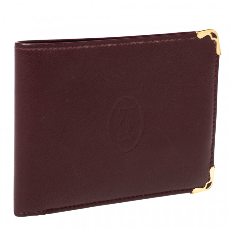 مملوكة مسبقًا Cartier Burgundy Leather Must De Cartier 6CC Bifold Wallet
