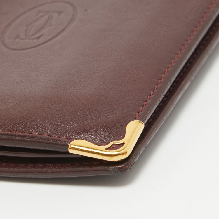 Pre Owned Cartier Burgundy Leather Must De Cartier Bifold Wallet 