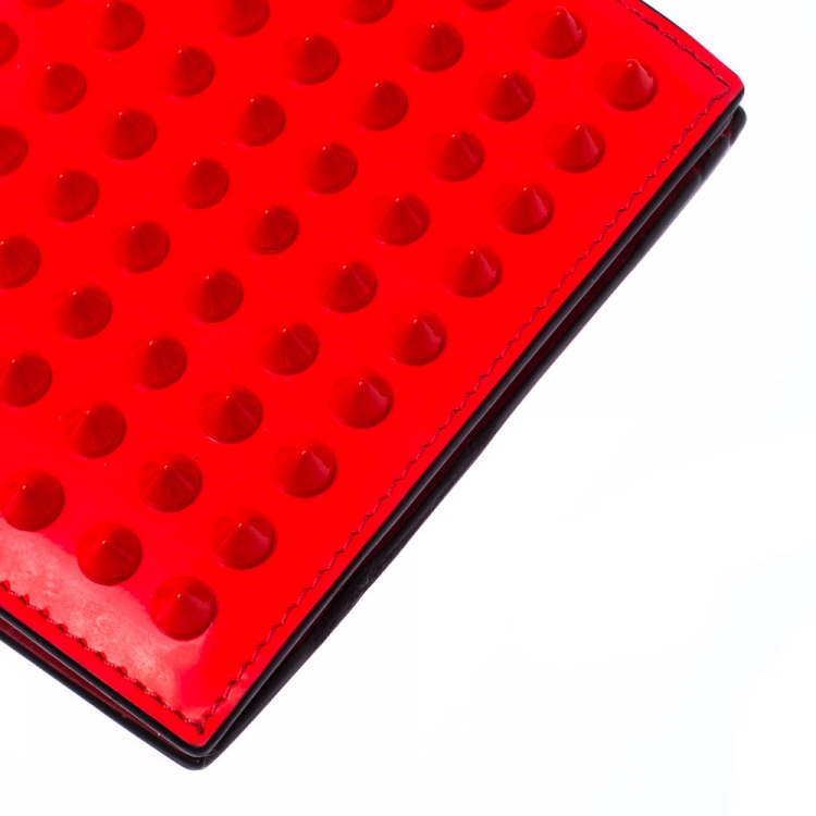 Pre Owned Christian Louboutin Neon Orange Leather Clipsos Studded Bifold Wallet