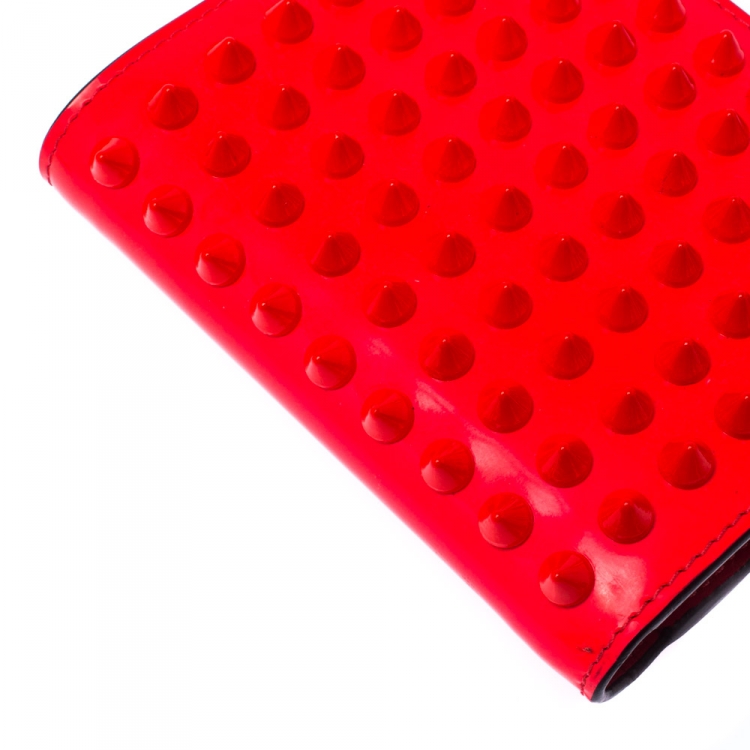 Pre Owned Christian Louboutin Neon Orange Leather Clipsos Studded Bifold Wallet