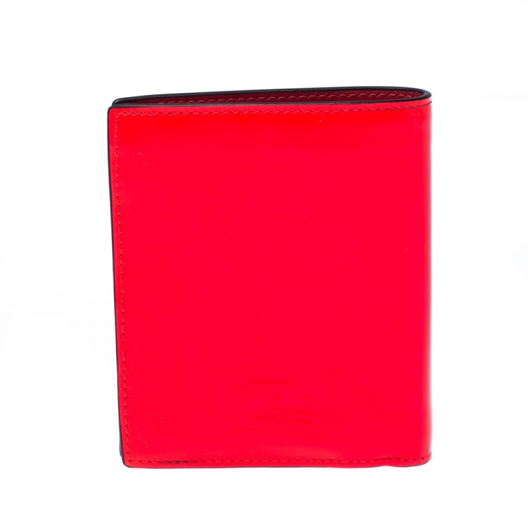 Pre Owned Christian Louboutin Neon Orange Leather Clipsos Studded Bifold Wallet