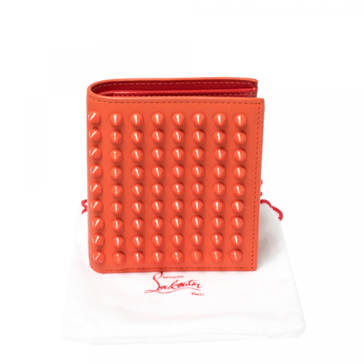 Pre Owned Christian Louboutin Neon Orange Leather Clipsos Studded Bifold Wallet