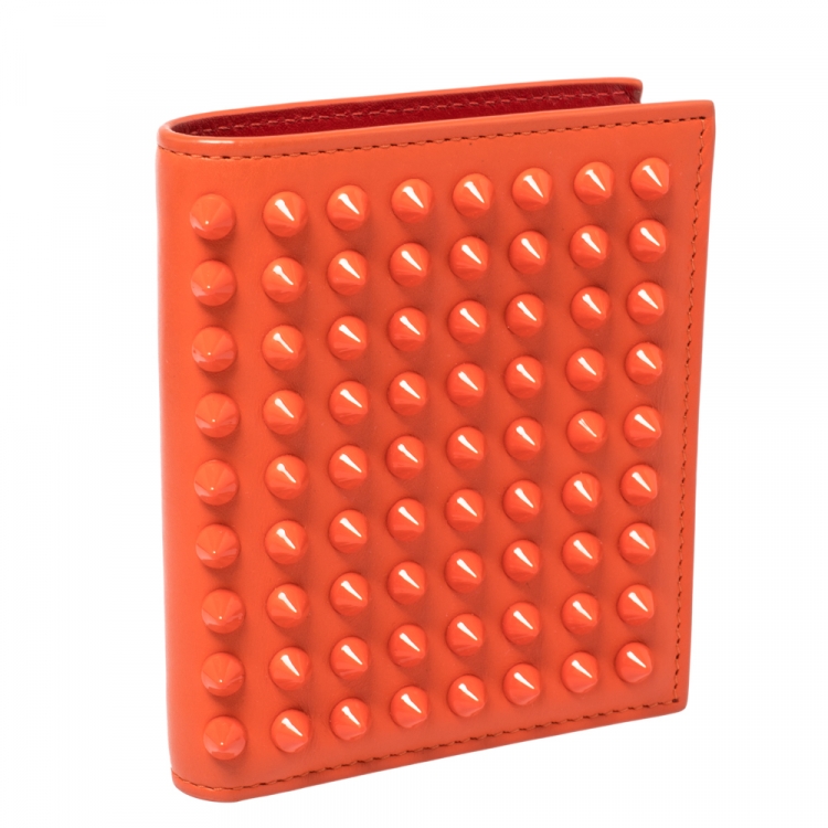 Pre Owned Christian Louboutin Neon Orange Leather Clipsos Studded Bifold Wallet