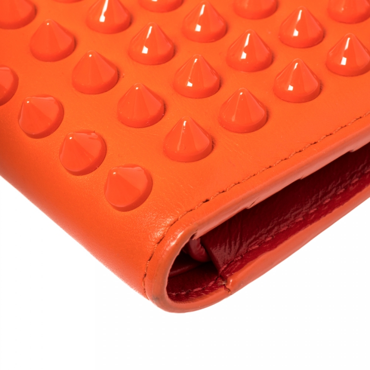 Pre Owned Christian Louboutin Neon Orange Leather Clipsos Studded Bifold Wallet