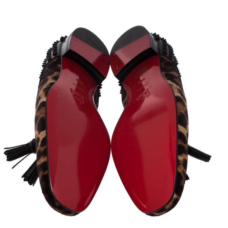 Pre Owned Christian Louboutin Leopard Print Pony Hair And Black Leather Spiked Tassilo Loafers Size 42.5